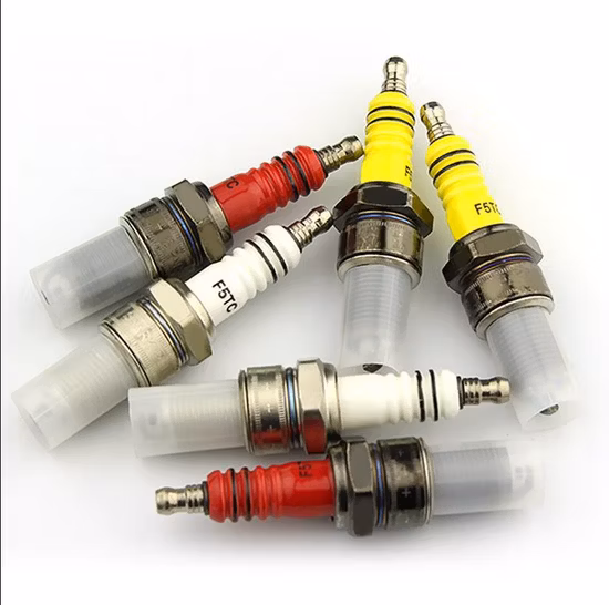 Piezas del motor baratas de fábrica A7tc B7tc F7tc Bujía para motocicleta Scooter